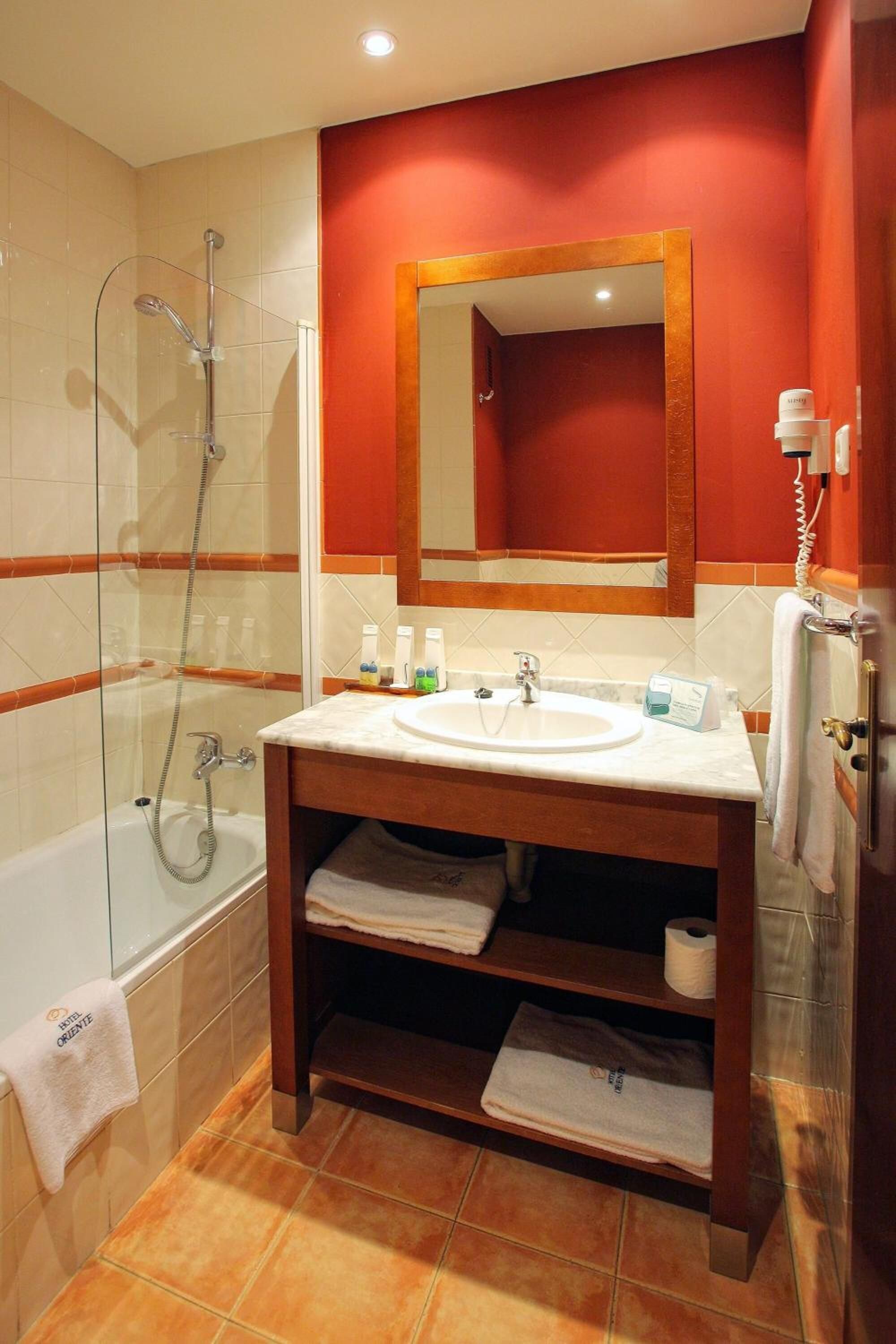 hair dryer, bidet, towels