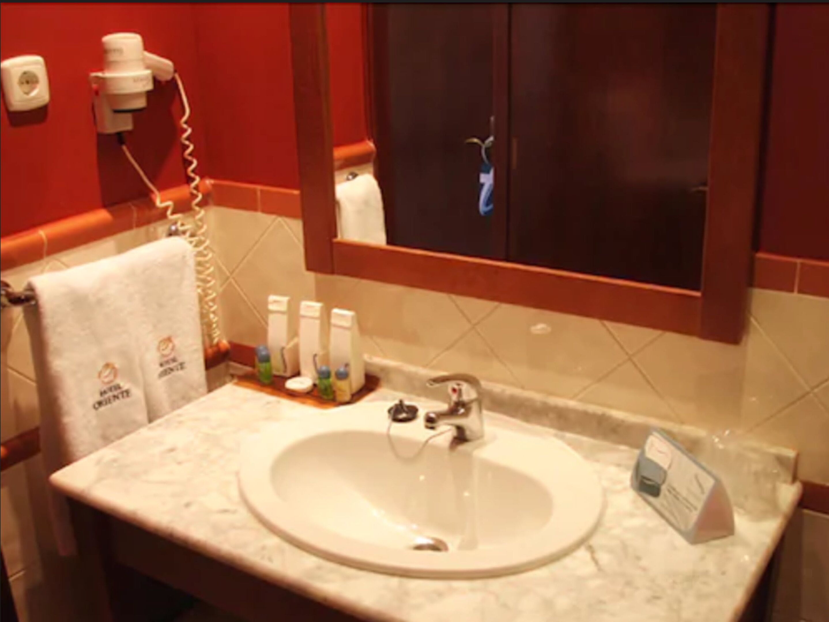 hair dryer, bidet, towels