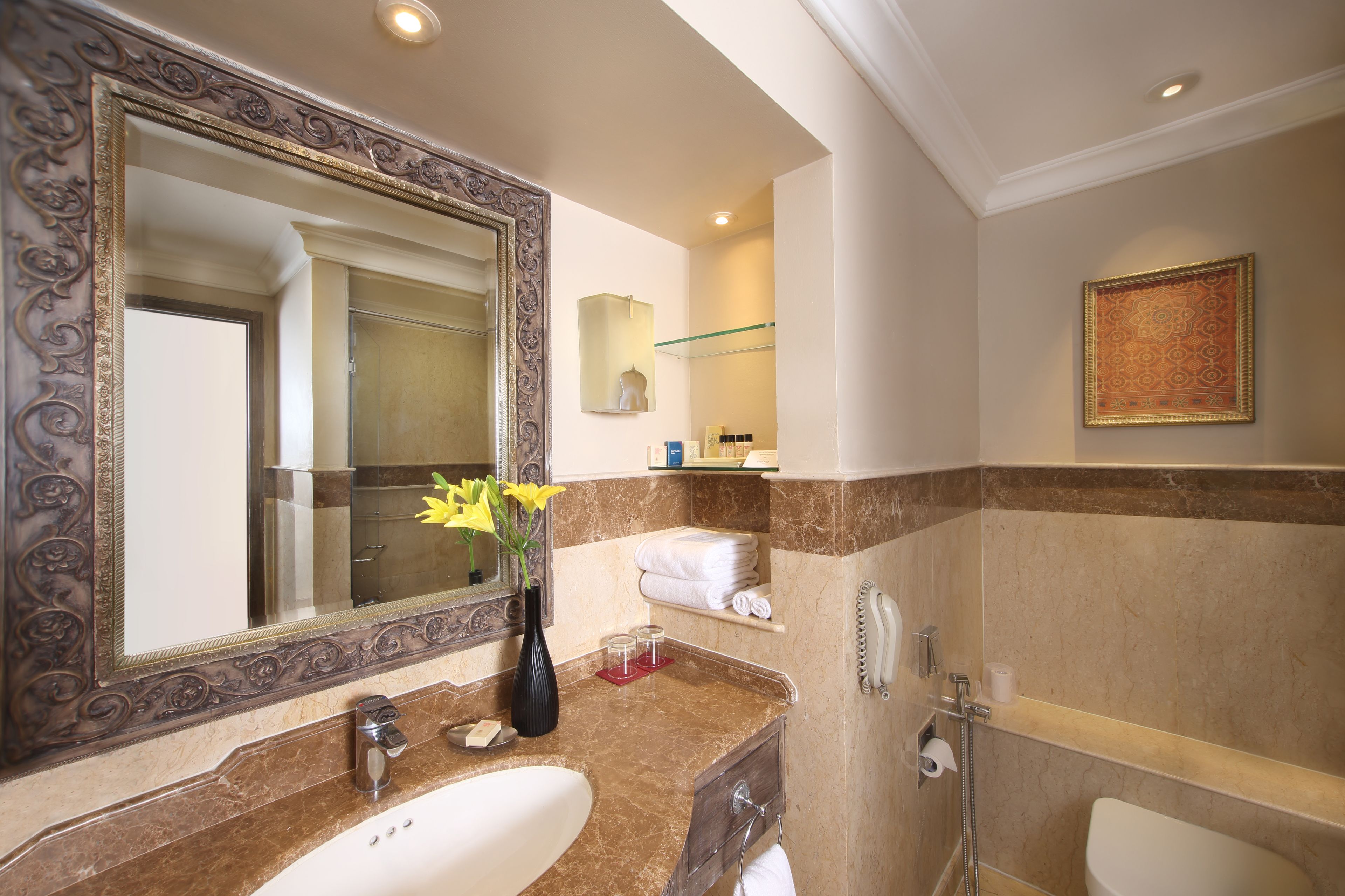 deluxe room, 1 king bed, pool view | bathroom | combined shower/bathtub, deep-soaking bathtub, free toiletries