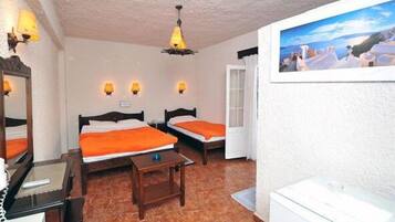 Economy Triple Room (Semi-Basement) | In-room safe, desk, soundproofing, iron/ironing board