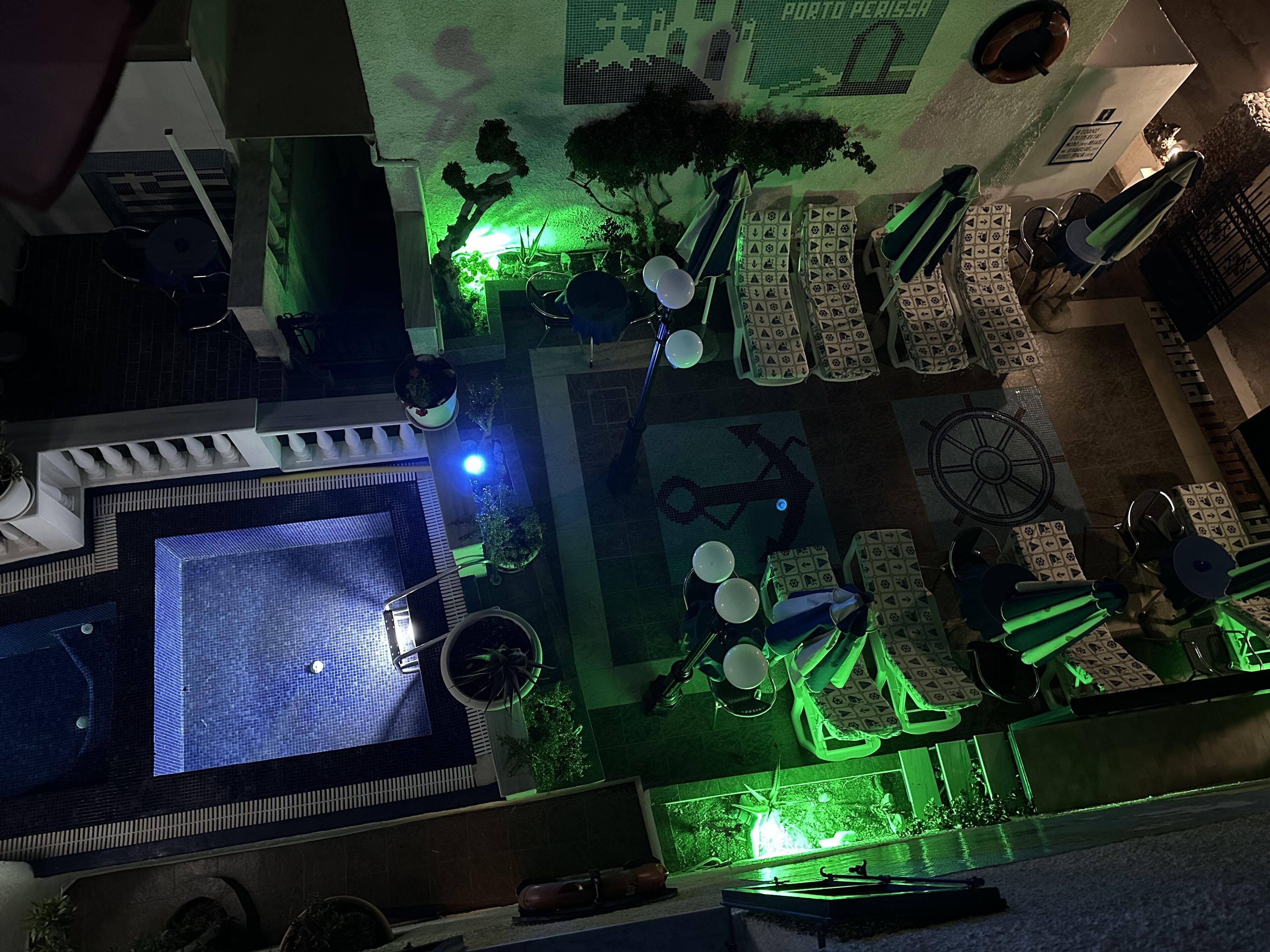 seasonal outdoor pool, open 8:00 am to 8:00 pm, pool umbrellas