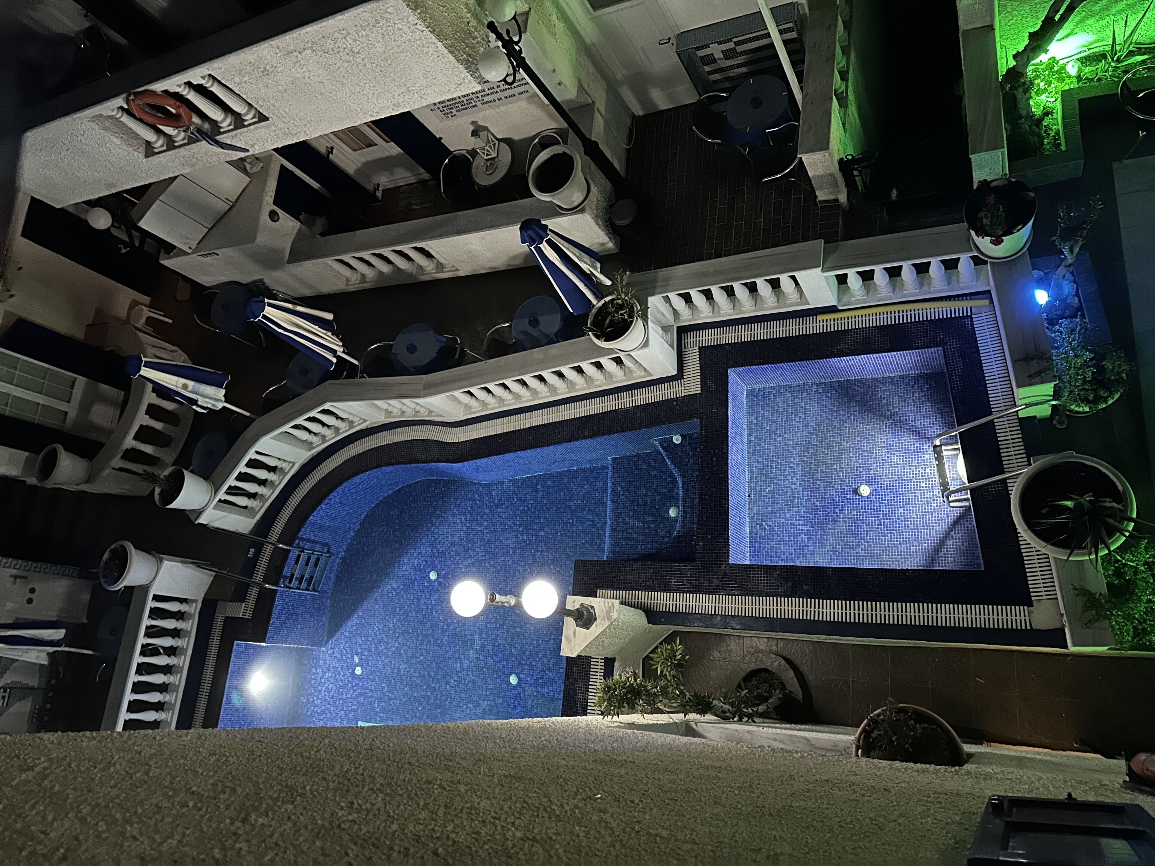 seasonal outdoor pool, open 8:00 am to 8:00 pm, pool umbrellas