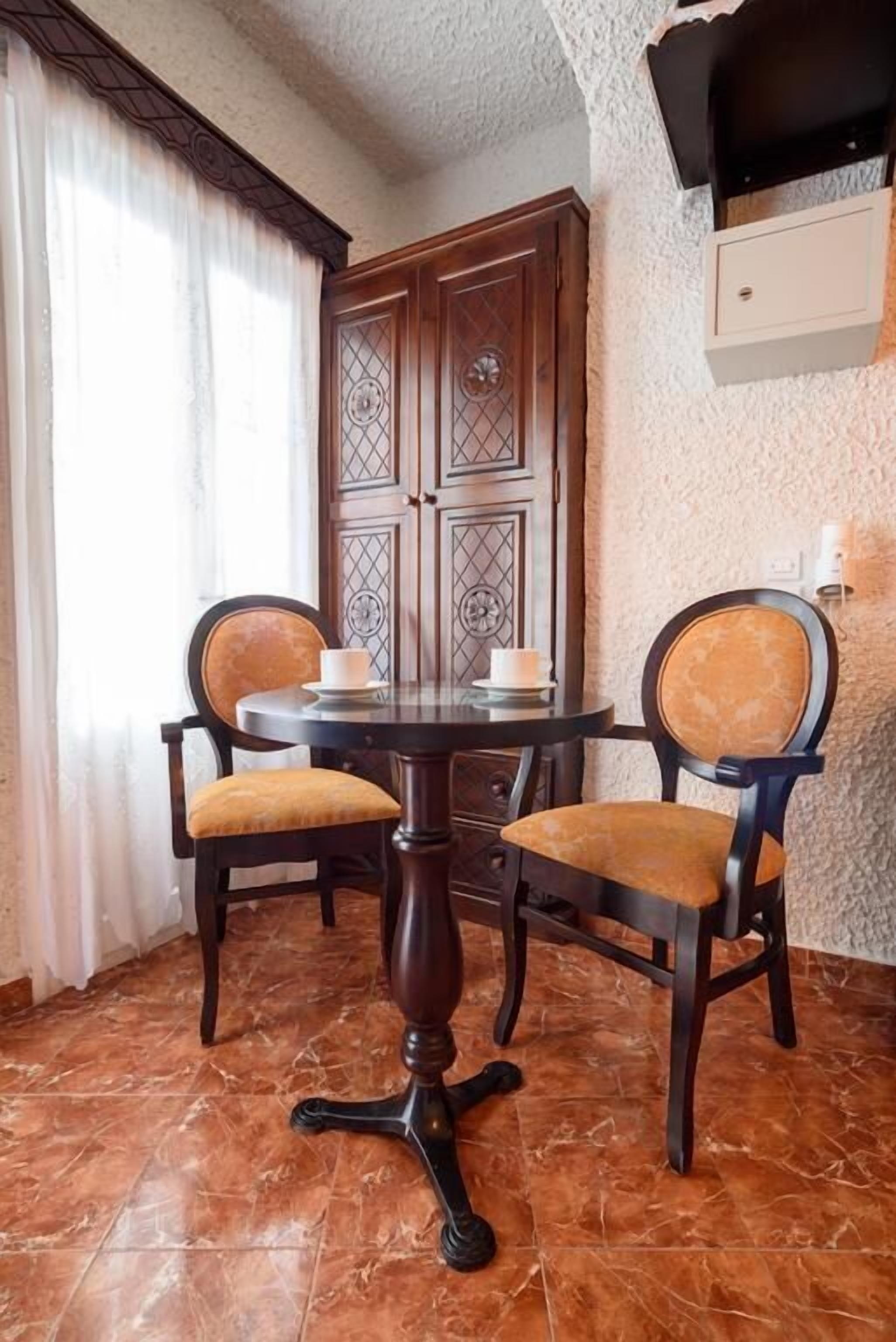 quadruple room | living area | 21-inch flat-screen tv with satellite channels, tv