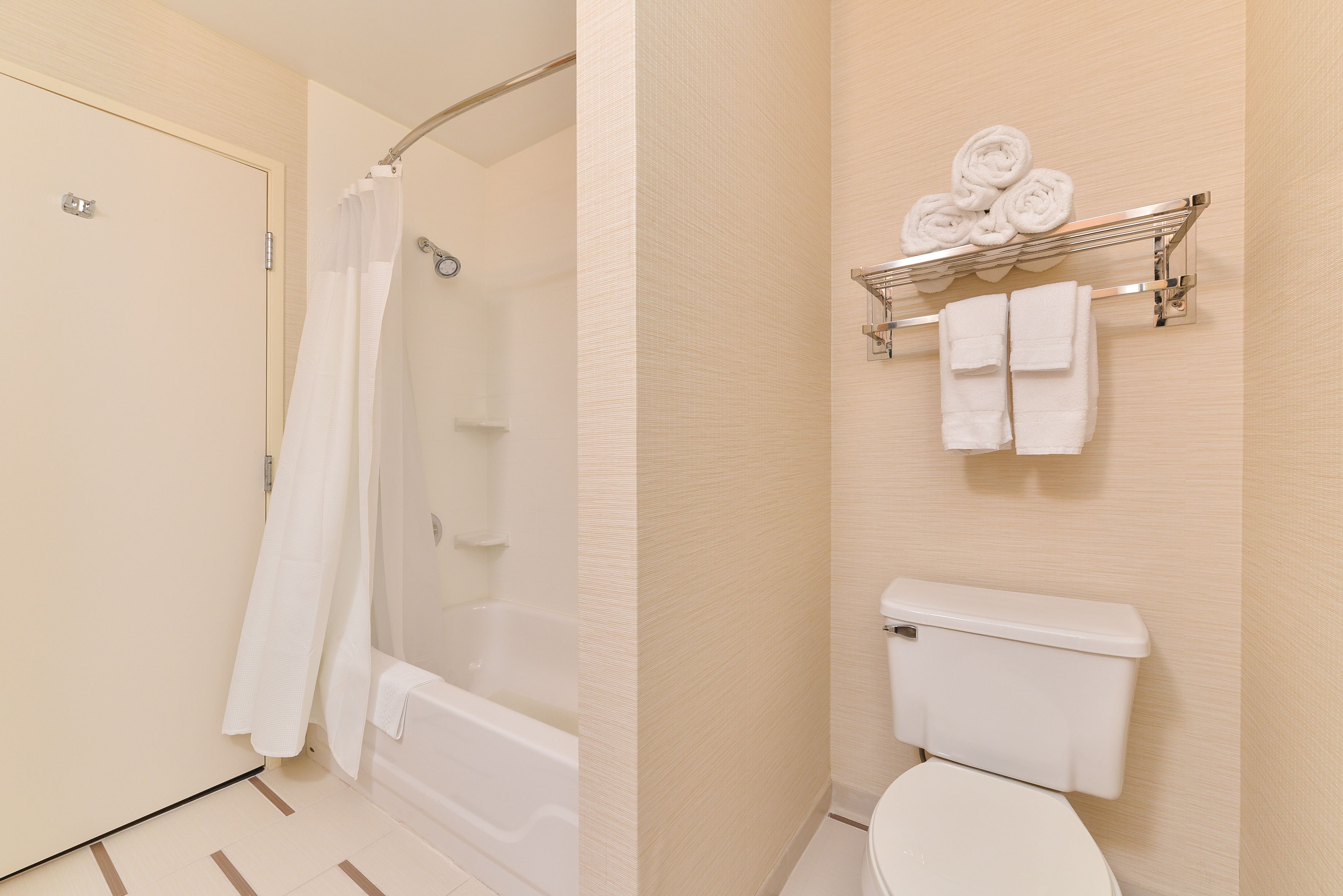 combined shower/bathtub, free toiletries, hair dryer, towels