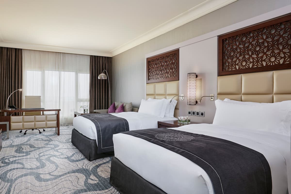 Premium bedding, down comforters, minibar, in-room safe