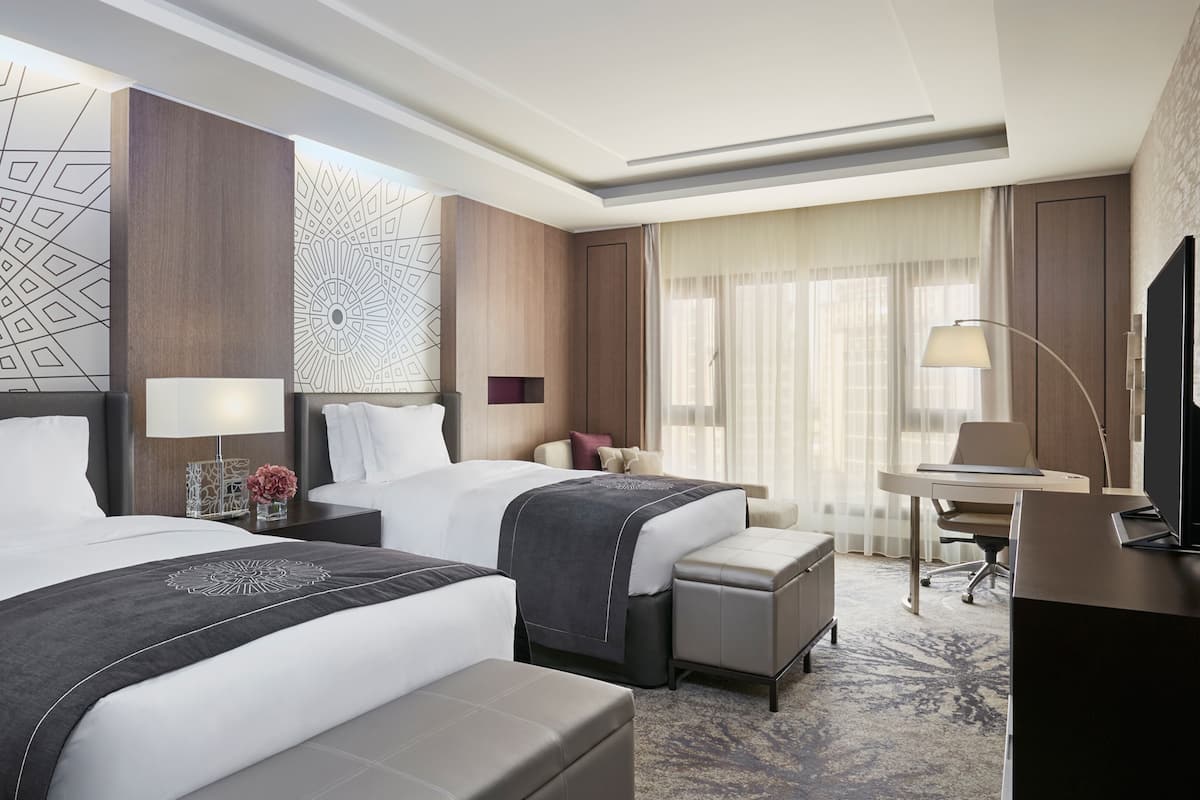 Premium bedding, down comforters, minibar, in-room safe