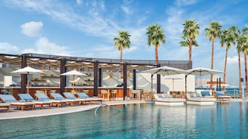 Outdoor pool, pool umbrellas, pool loungers