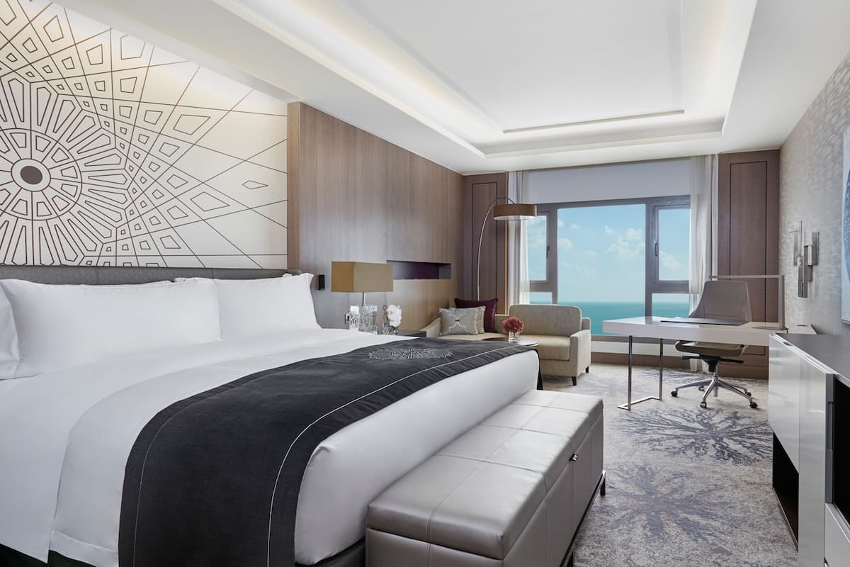 Premium bedding, down comforters, minibar, in-room safe