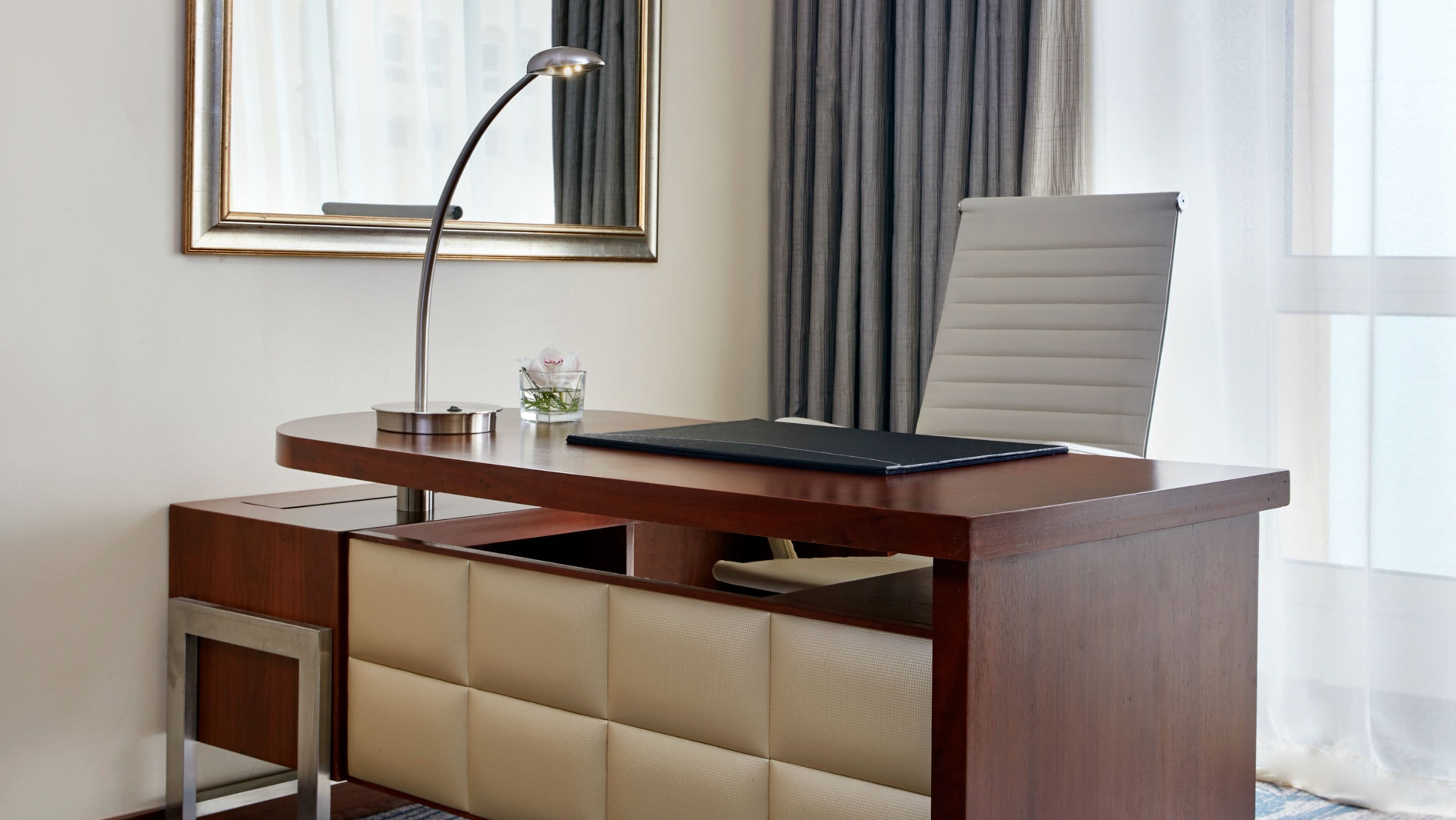 Premium bedding, down comforters, minibar, in-room safe