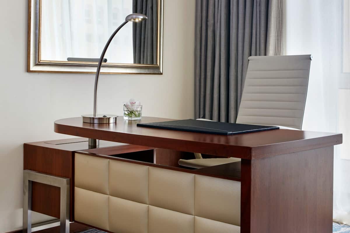 Premium bedding, down comforters, minibar, in-room safe