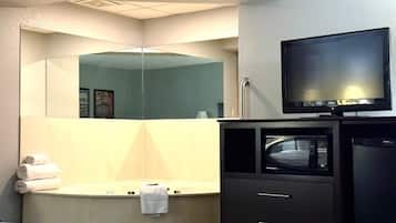Deluxe Studio Suite, 1 King Bed, Non Smoking | Desk, laptop workspace, blackout drapes, iron/ironing board