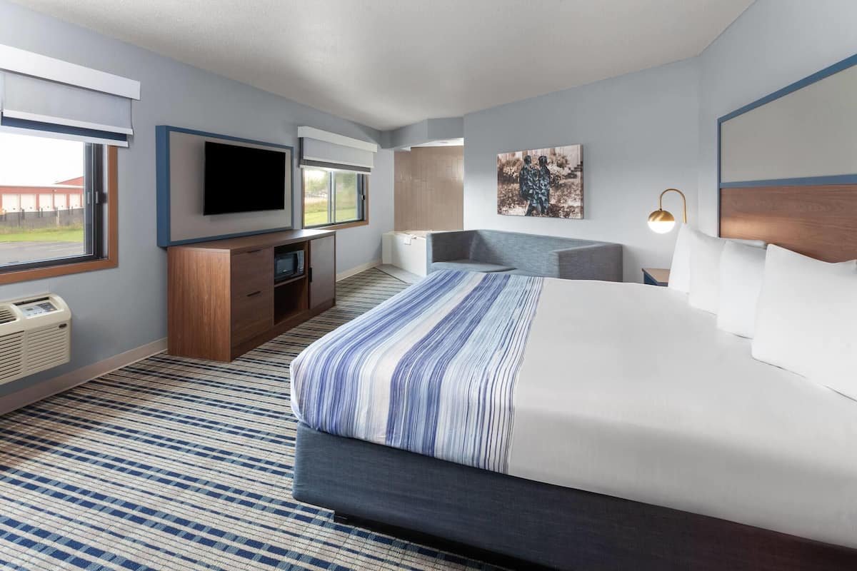 Suite Deluxe, 1 très grand lit, non-fumeurs | Baignoire à jets