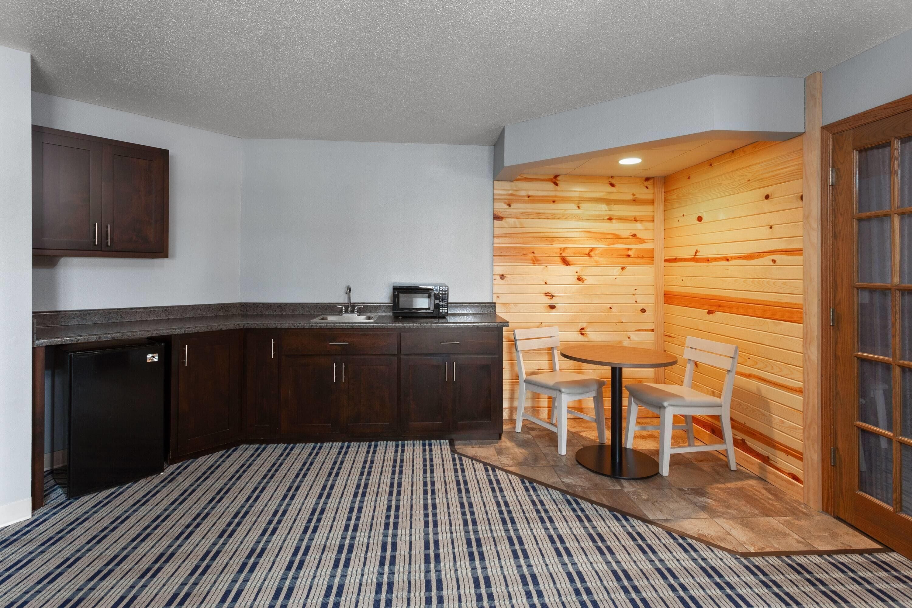 premier suite, 1 king bed, non smoking (one-bedroom) | desk, iron/ironing board, free cots/infant beds, free wifi