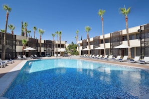 Indoor pool, seasonal outdoor pool, pool umbrellas, pool loungers