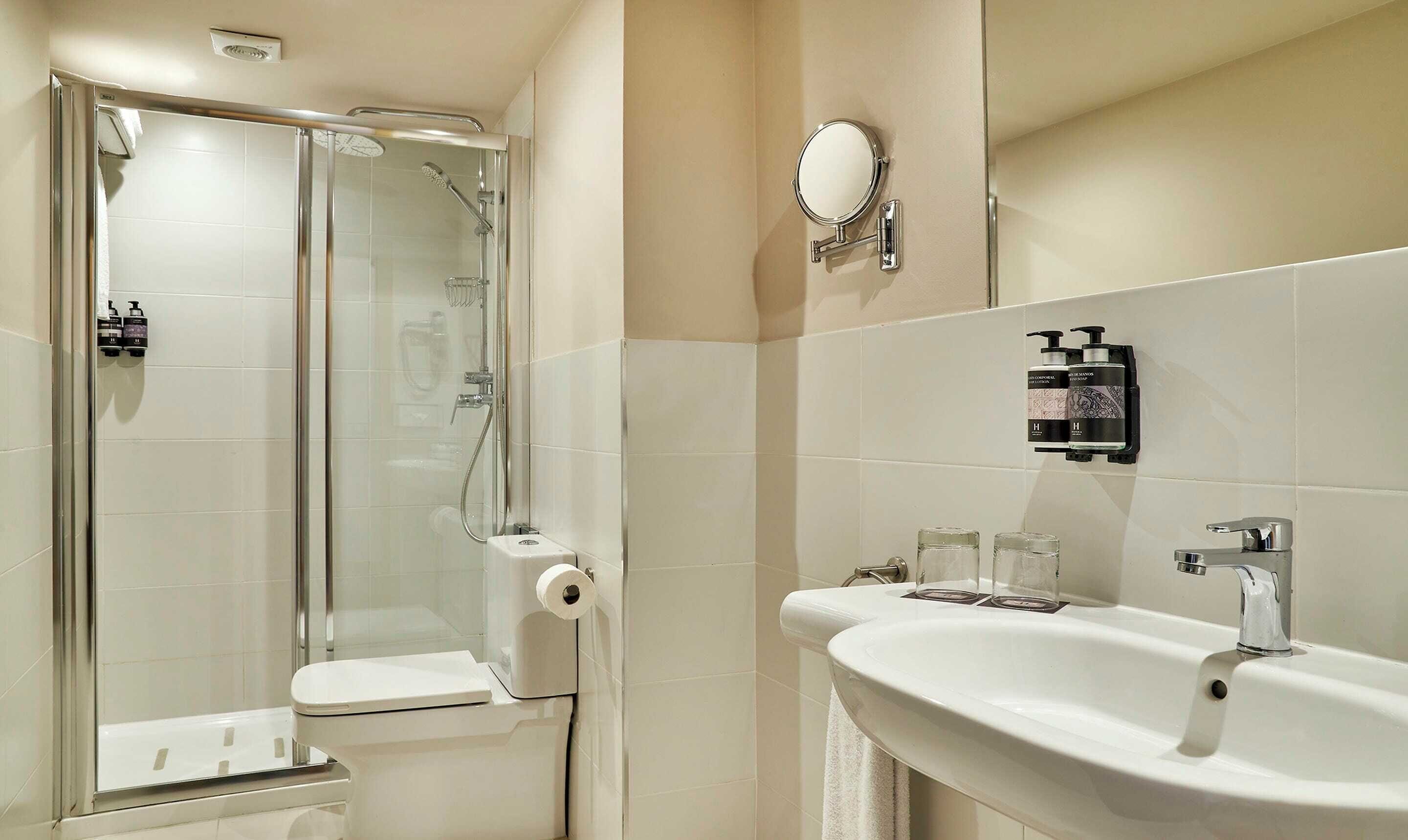 shower, free toiletries, hair dryer, towels