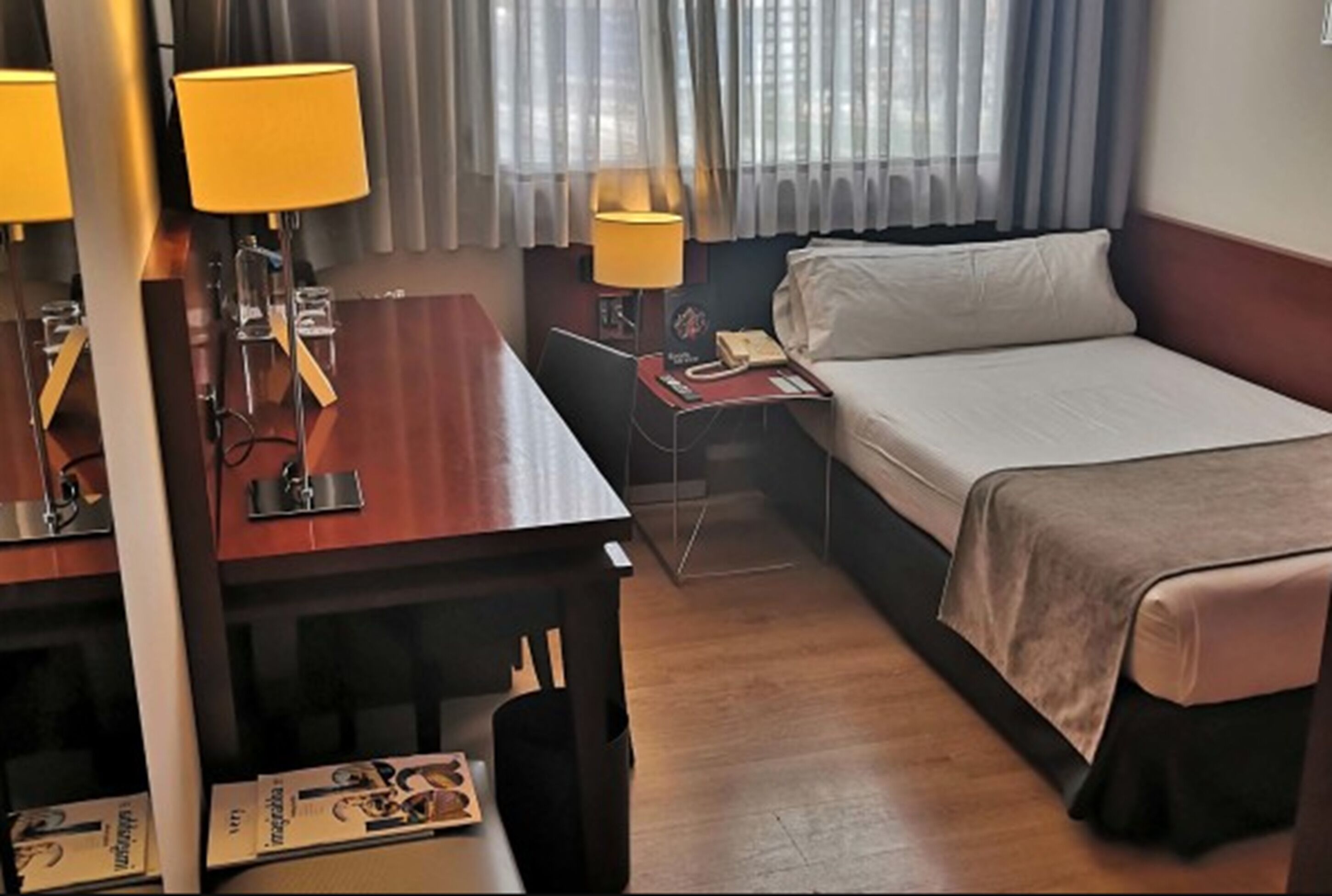 basic room | minibar, in-room safe, desk, blackout curtains