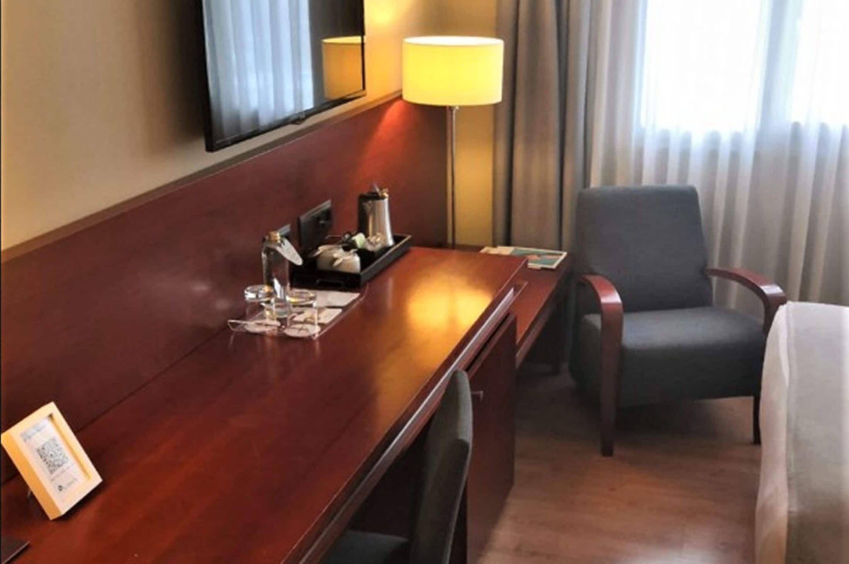 basic room | minibar, in-room safe, desk, blackout curtains