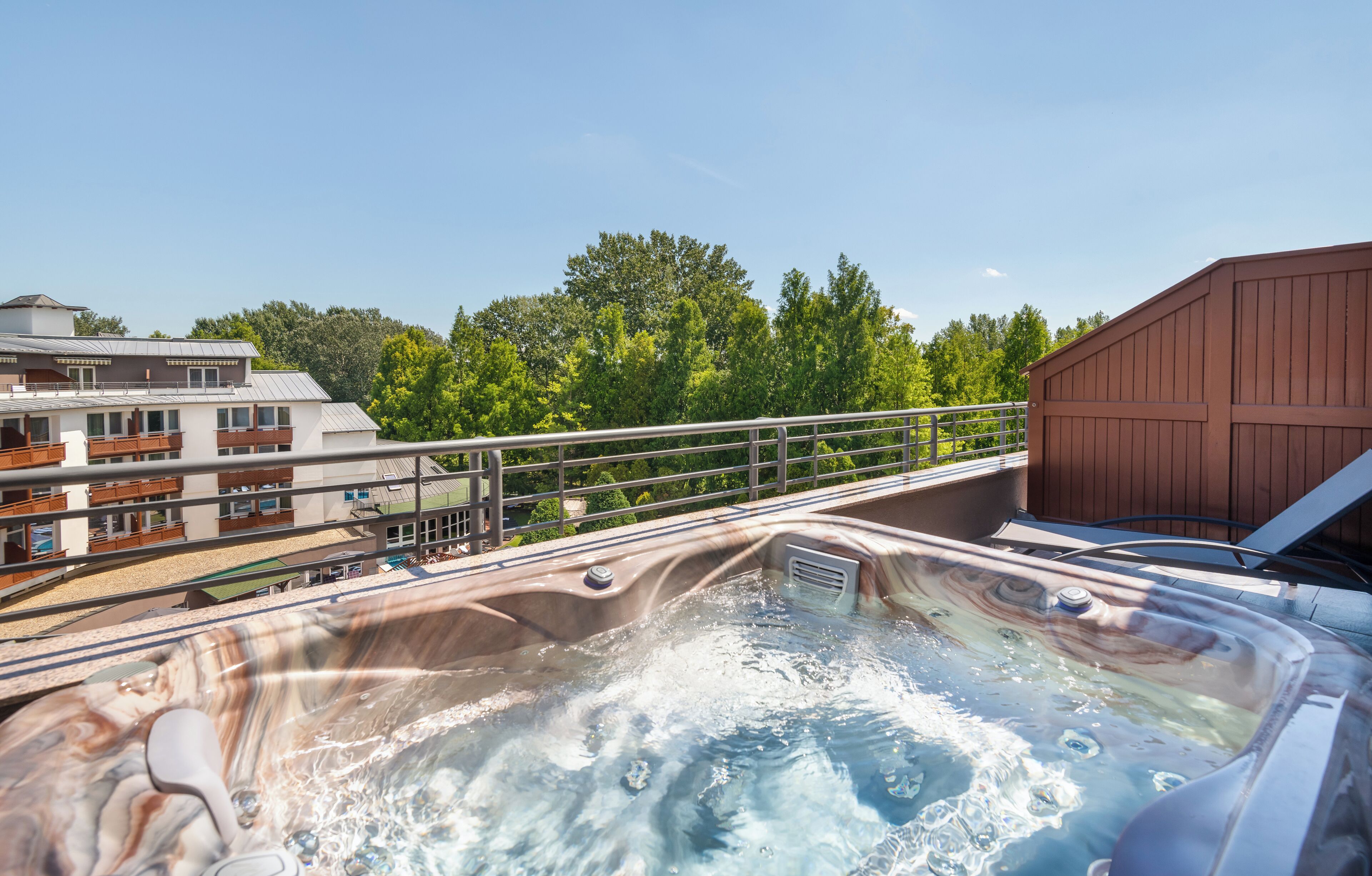 junior studio suite, 1 bedroom jacuzzi& infrasauna | balcony view