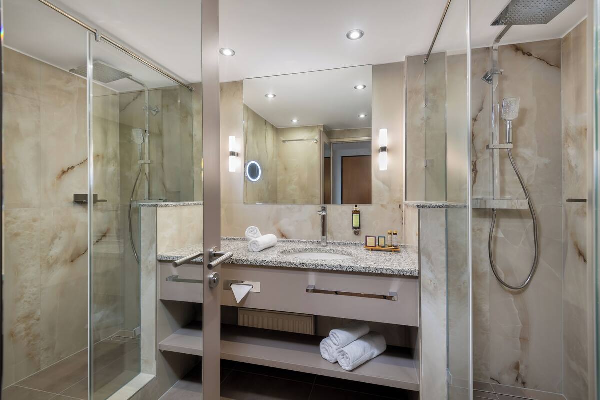 junior studio suite, 1 bedroom jacuzzi& infrasauna | bathroom | free toiletries, hair dryer, bathrobes, slippers