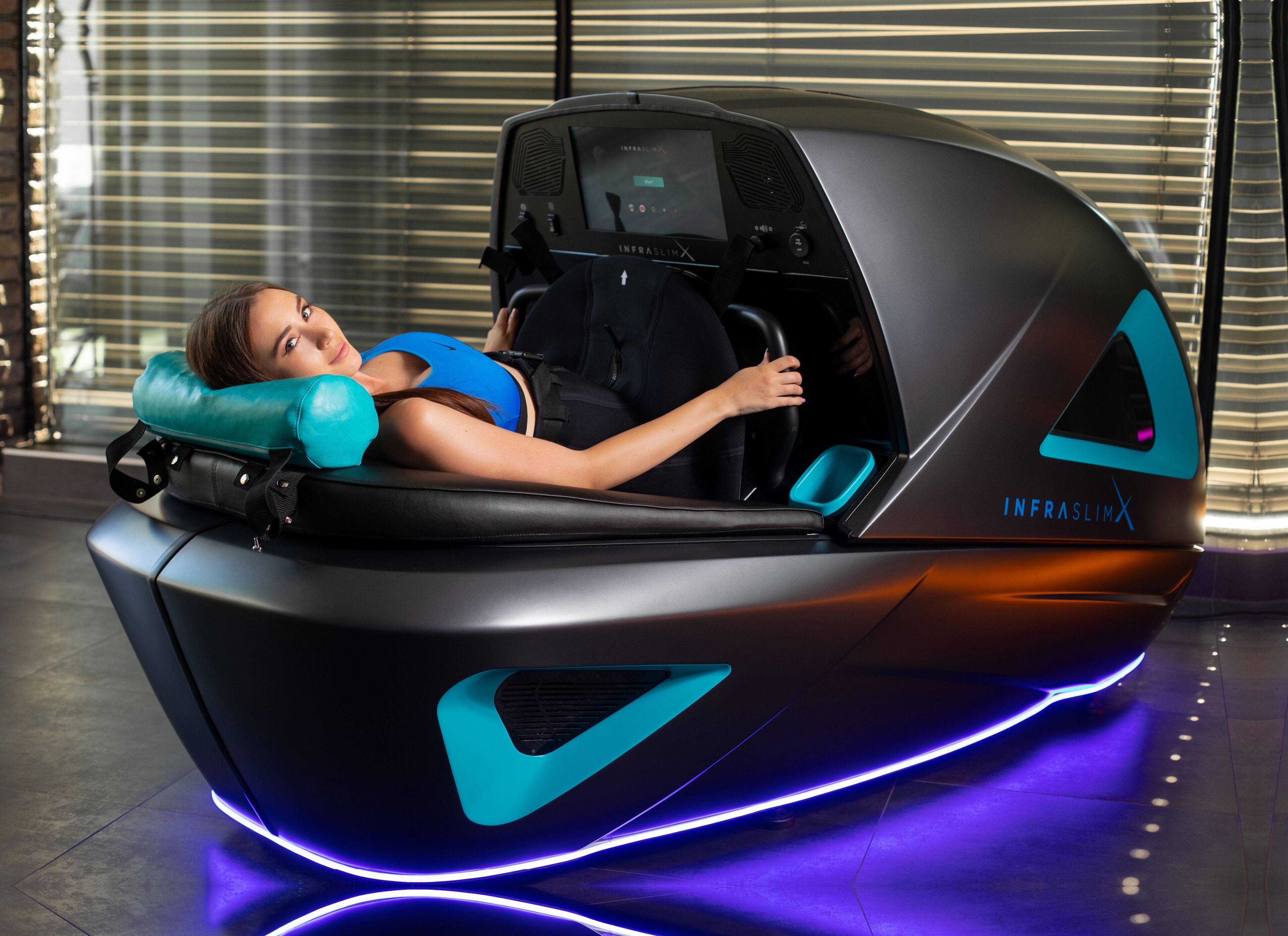 A futuristic vehicle with a steering wheel and a digital display, labeled "INFRASLIMX."