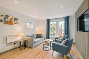 Apartment, Two Bedrooms | Living area | 32-inch LCD TV with digital channels, TV