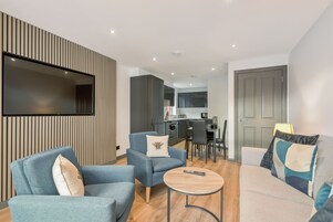 Apartment, Two Bedrooms | Living area | 32-inch LCD TV with digital channels, TV