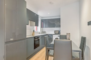 Apartment, Two Bedrooms | Private kitchen | Fridge, microwave, oven, stovetop