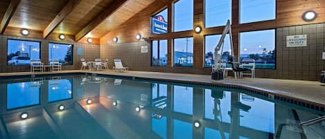 Indoor pool, open 6:00 AM to noon, pool loungers