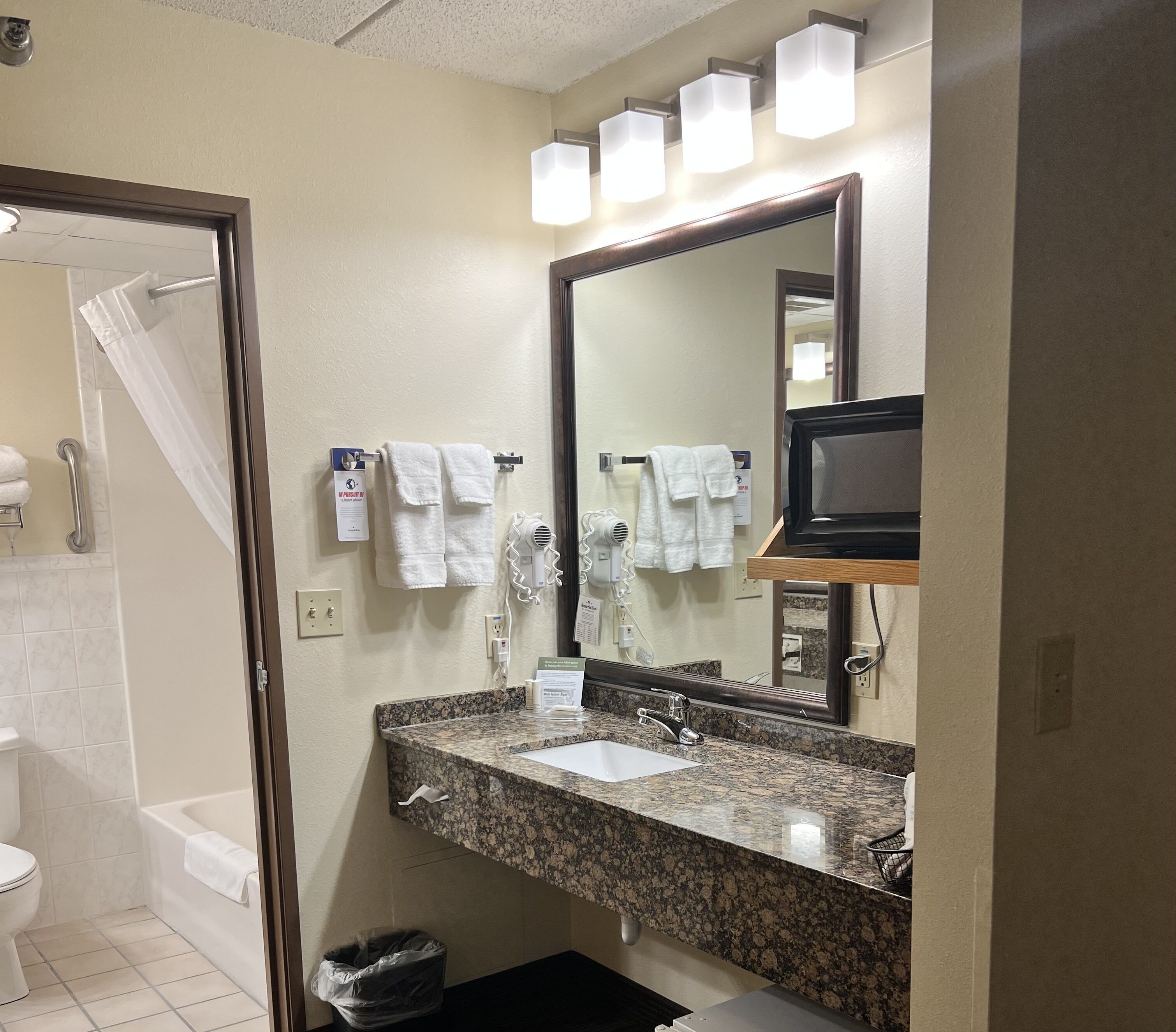 superior suite, 1 king bed, non smoking (one-bedroom) | bathroom | combined shower/bathtub, free toiletries, hair dryer, towels