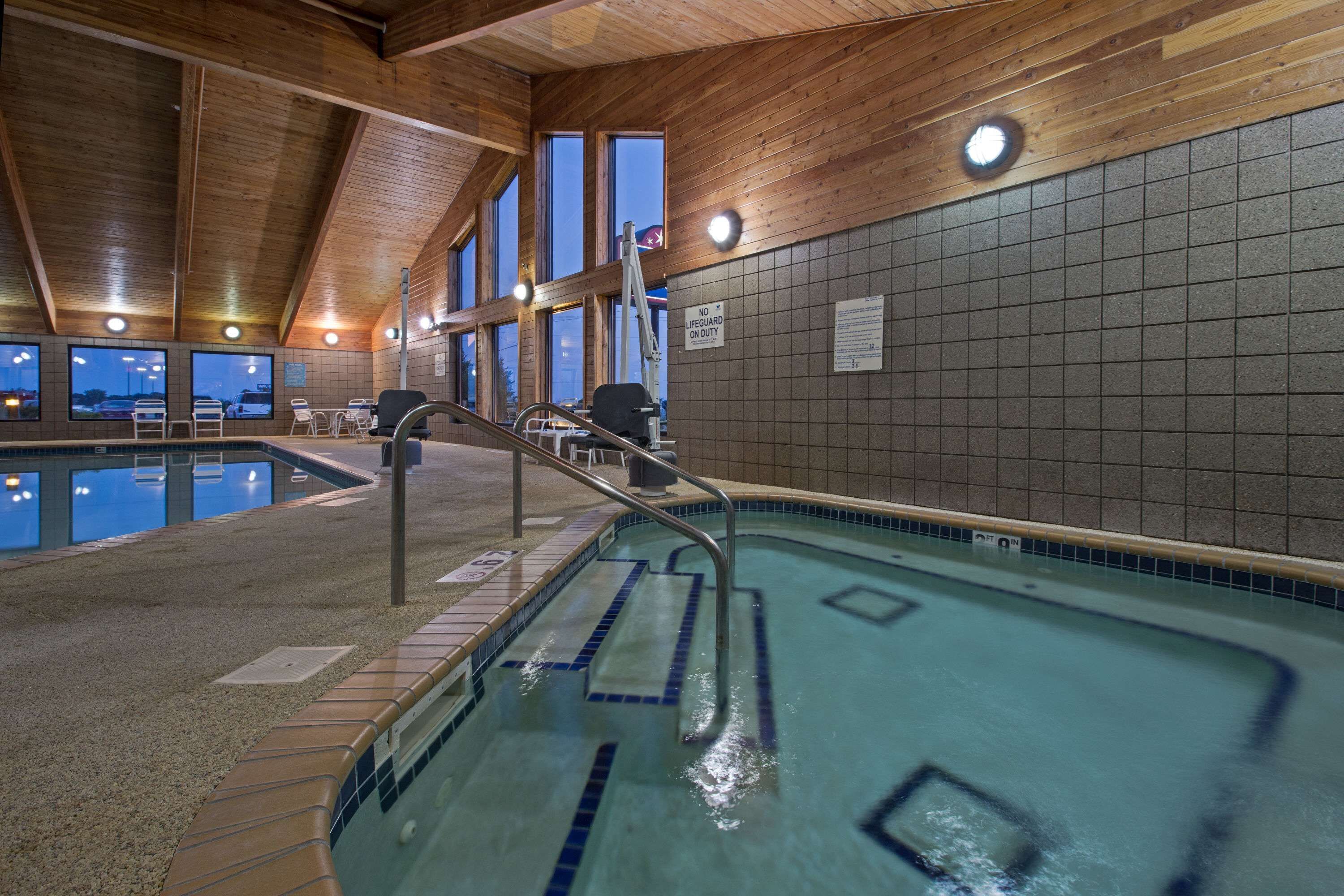 Indoor pool, open 6:00 AM to midnight, pool loungers