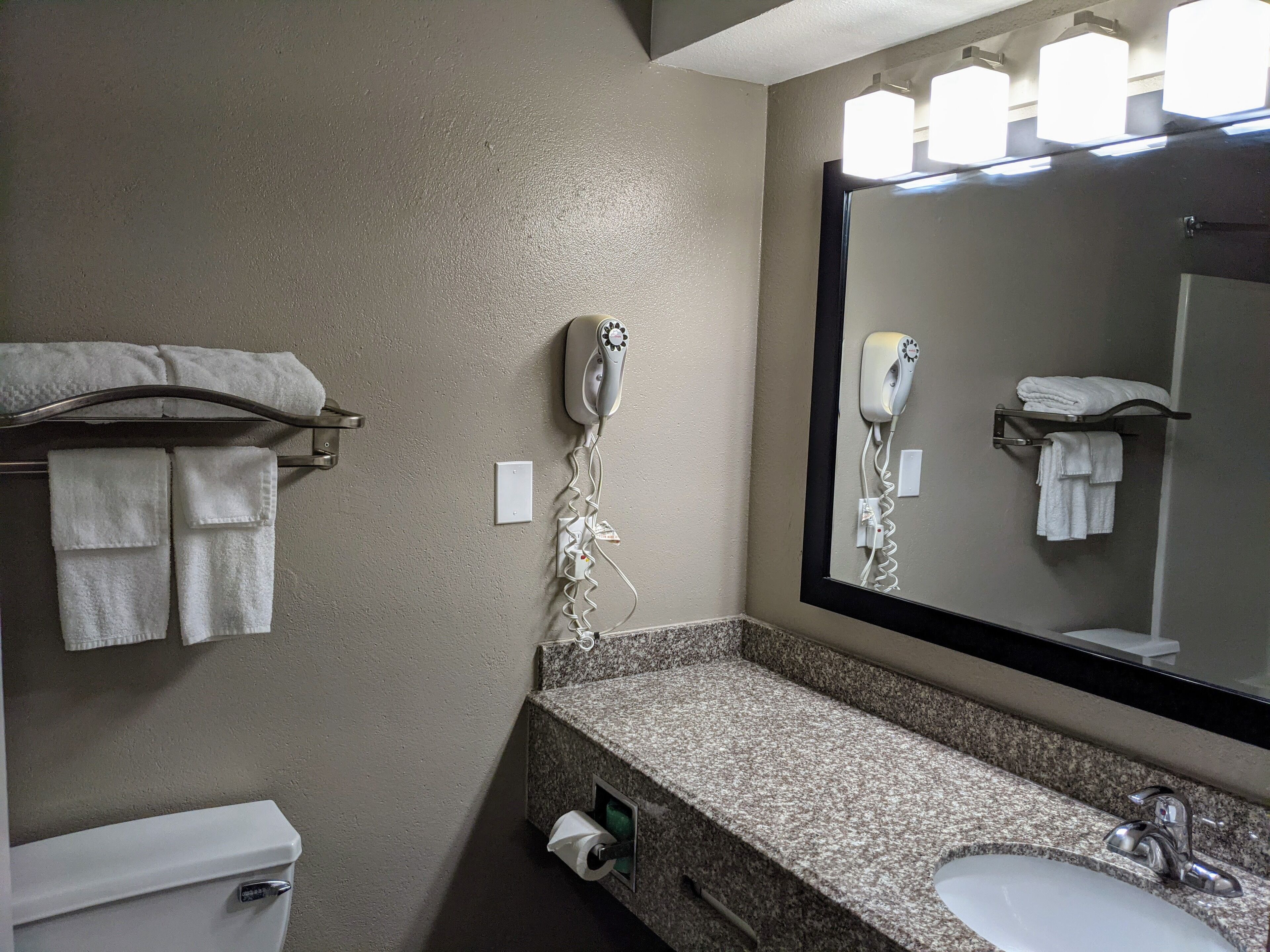 Hair dryer, towels, soap, toilet paper