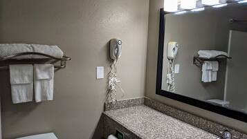 Hair dryer, towels, soap, toilet paper