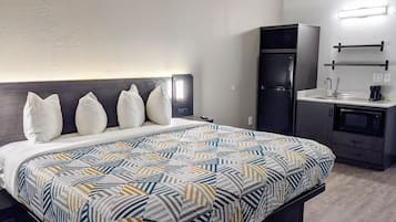 Desk, laptop workspace, blackout drapes, iron/ironing board