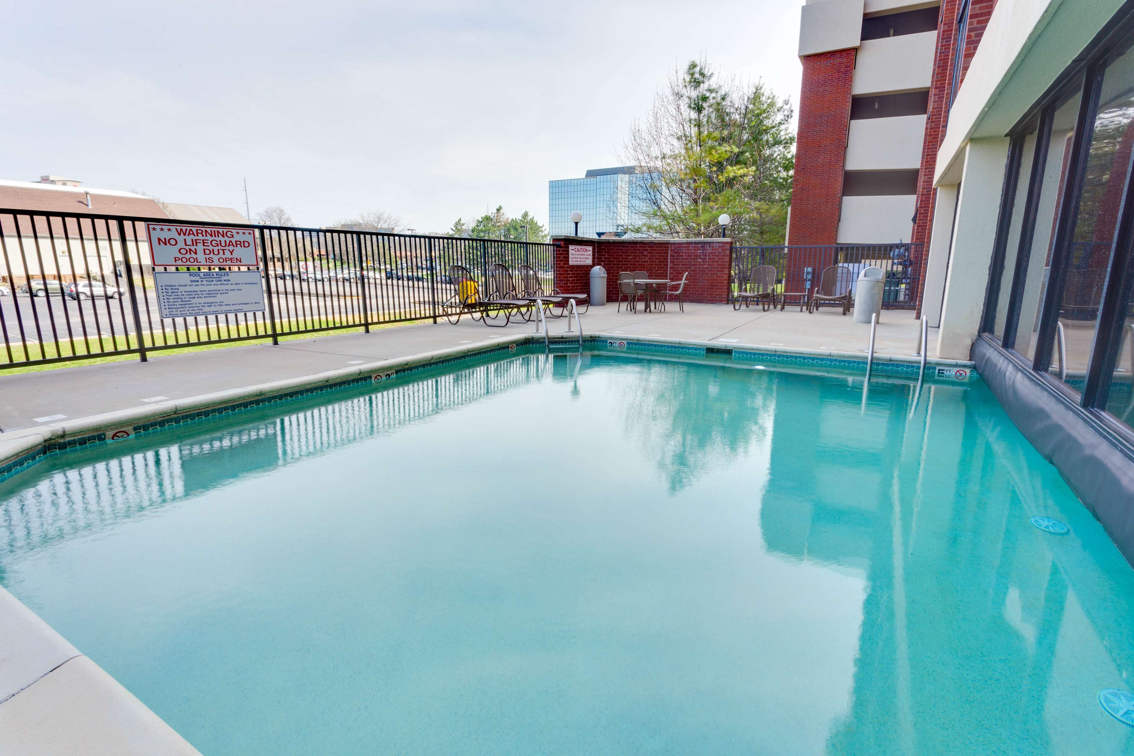 indoor pool, outdoor pool, open 9:00 am to 10:00 pm, pool loungers