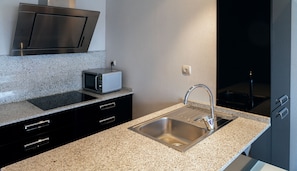 Suite Apartment Deluxe | Hochwertige Bettwaren, Daunenbettdecken