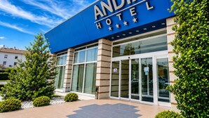 A modern hotel building with a prominent sign reading 'ANDIA HOTEL.' - Hotel Andia (Orcoyen)