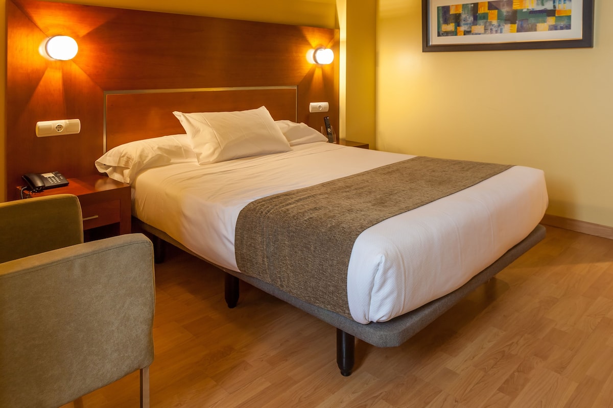 Premium bedding, down comforters, memory foam beds, minibar