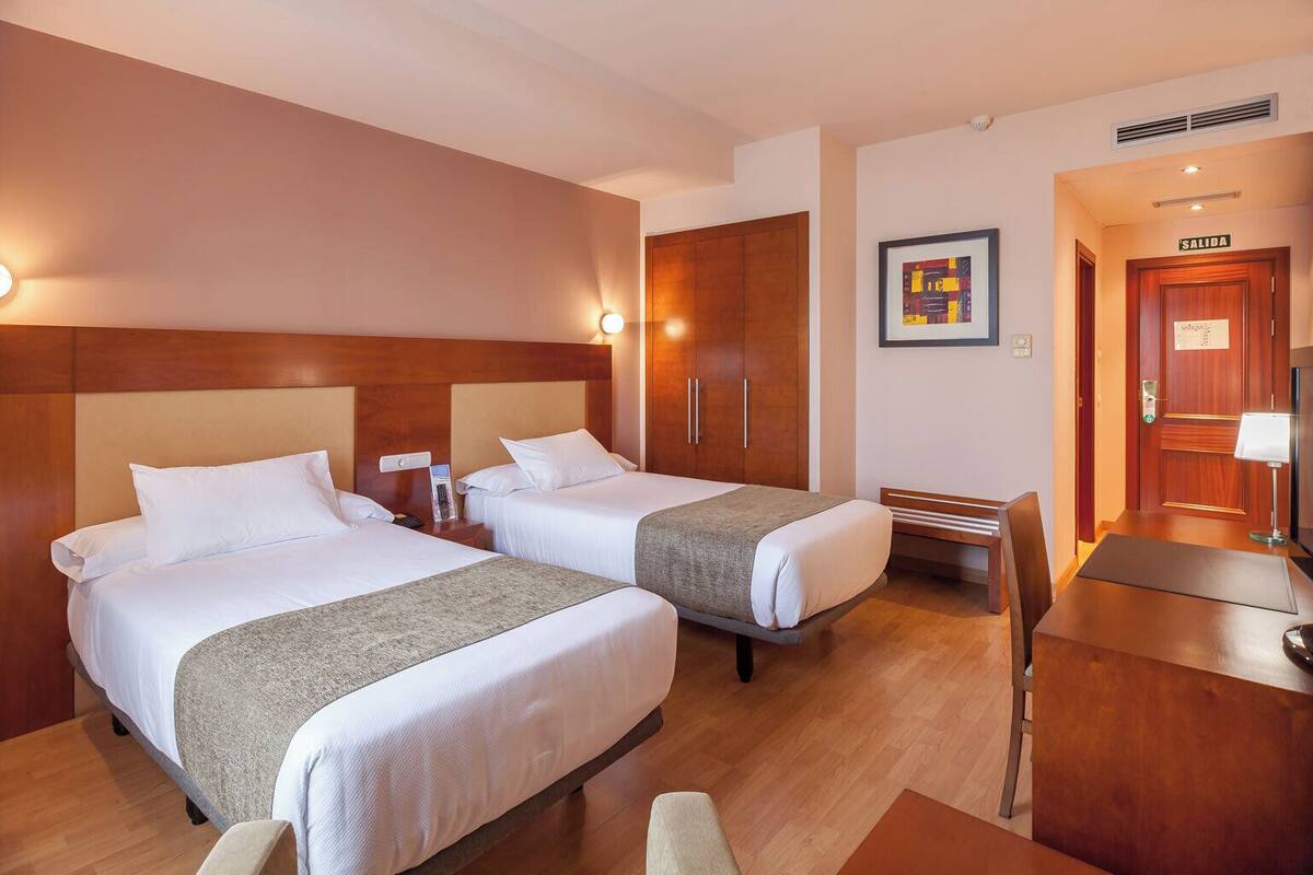 Premium bedding, memory foam beds, minibar, in-room safe
