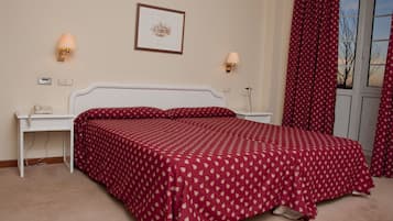 Desk, blackout drapes, iron/ironing board, free cribs/infant beds