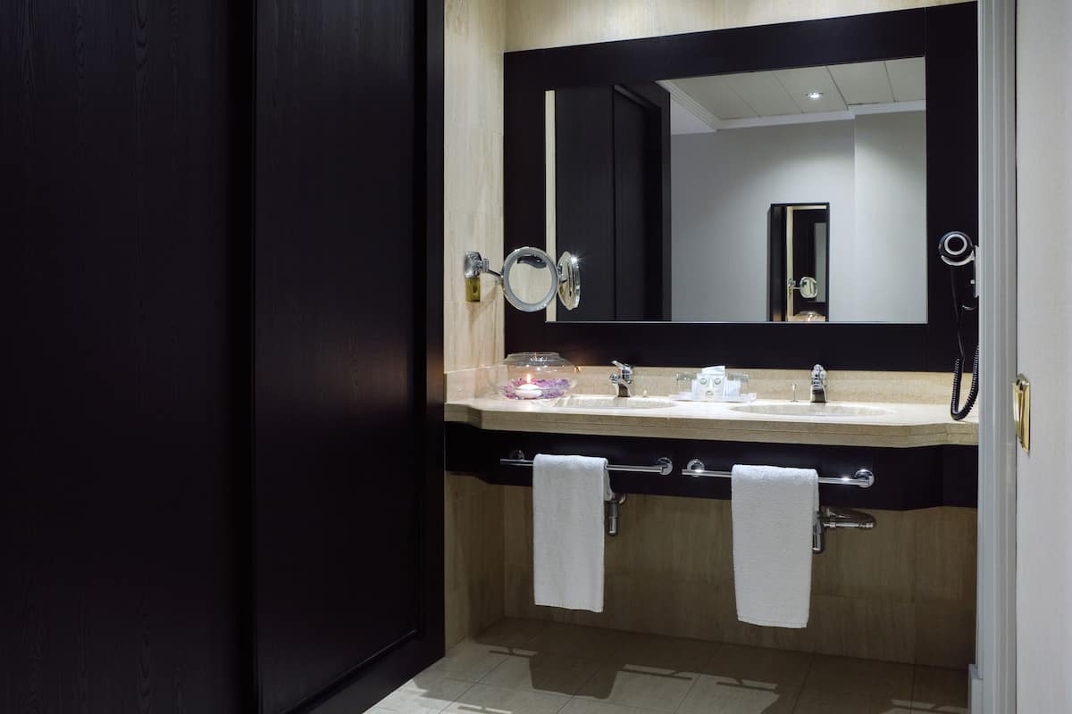 free toiletries, hair dryer, bidet, towels