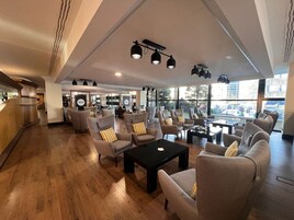 Flat-screen TV, pay movies