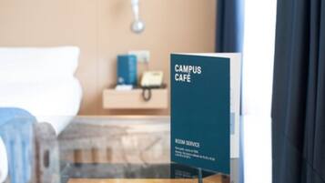 Skilt for en campuscafé med roomservice.