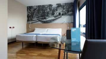 Verduisterende gordijnen, gratis wifi, beddengoed