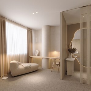 Deluxe Suite | Living area | 40-inch LCD TV with satellite channels, TV