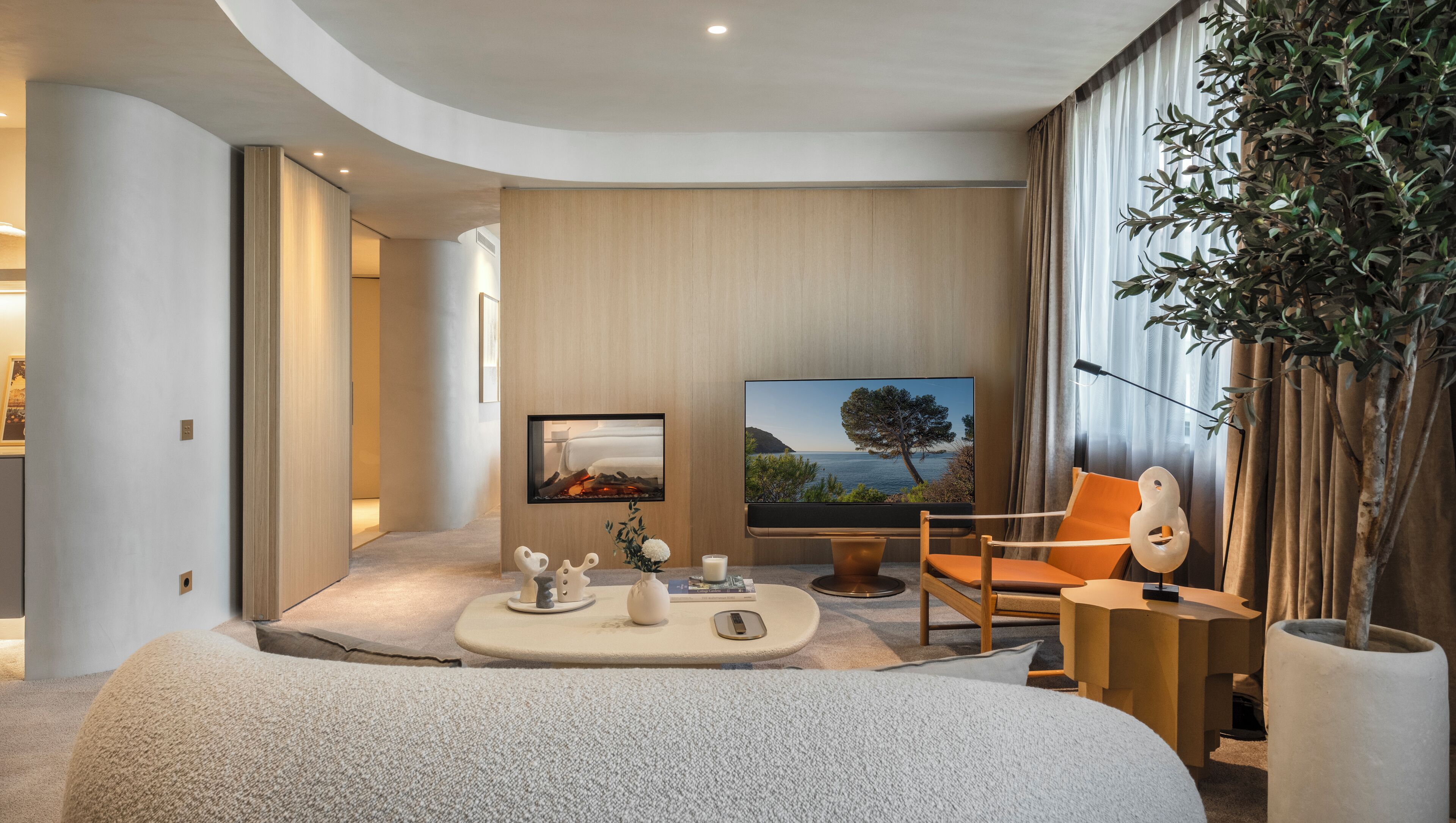 Deluxe Suite | Living area | 40-inch LCD TV with satellite channels, TV