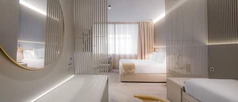 Deluxe-Vierbettzimmer | 1 Schlafzimmer, Bettwäsche aus ägyptischer Baumwolle