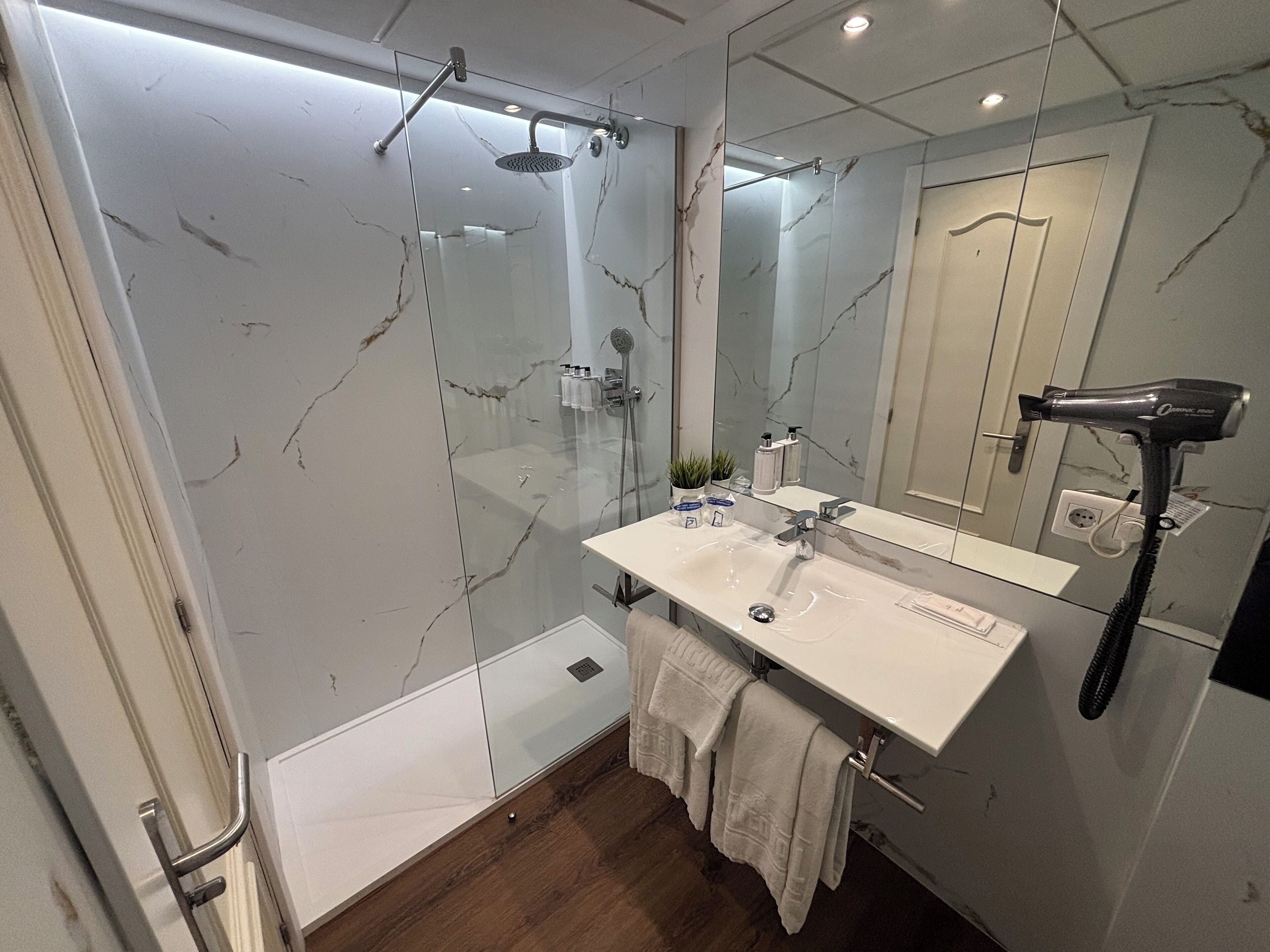 free toiletries, hair dryer, bathrobes, towels