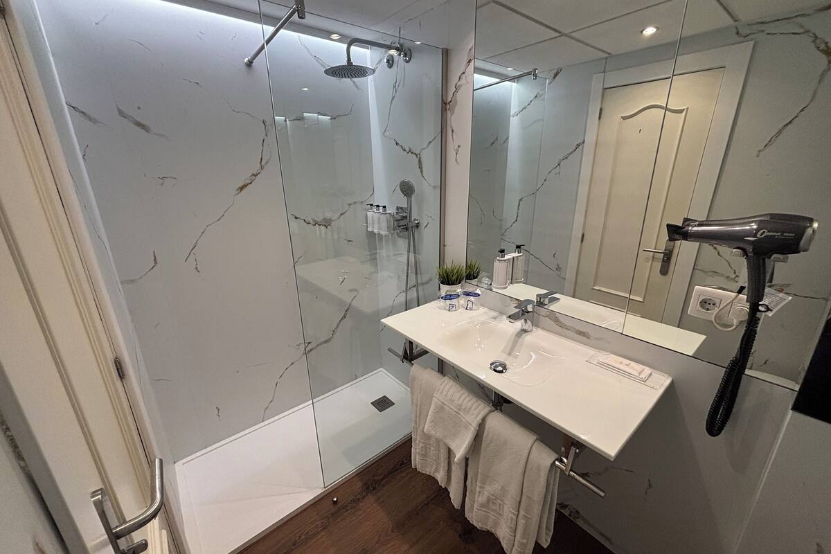 free toiletries, hair dryer, bathrobes, towels