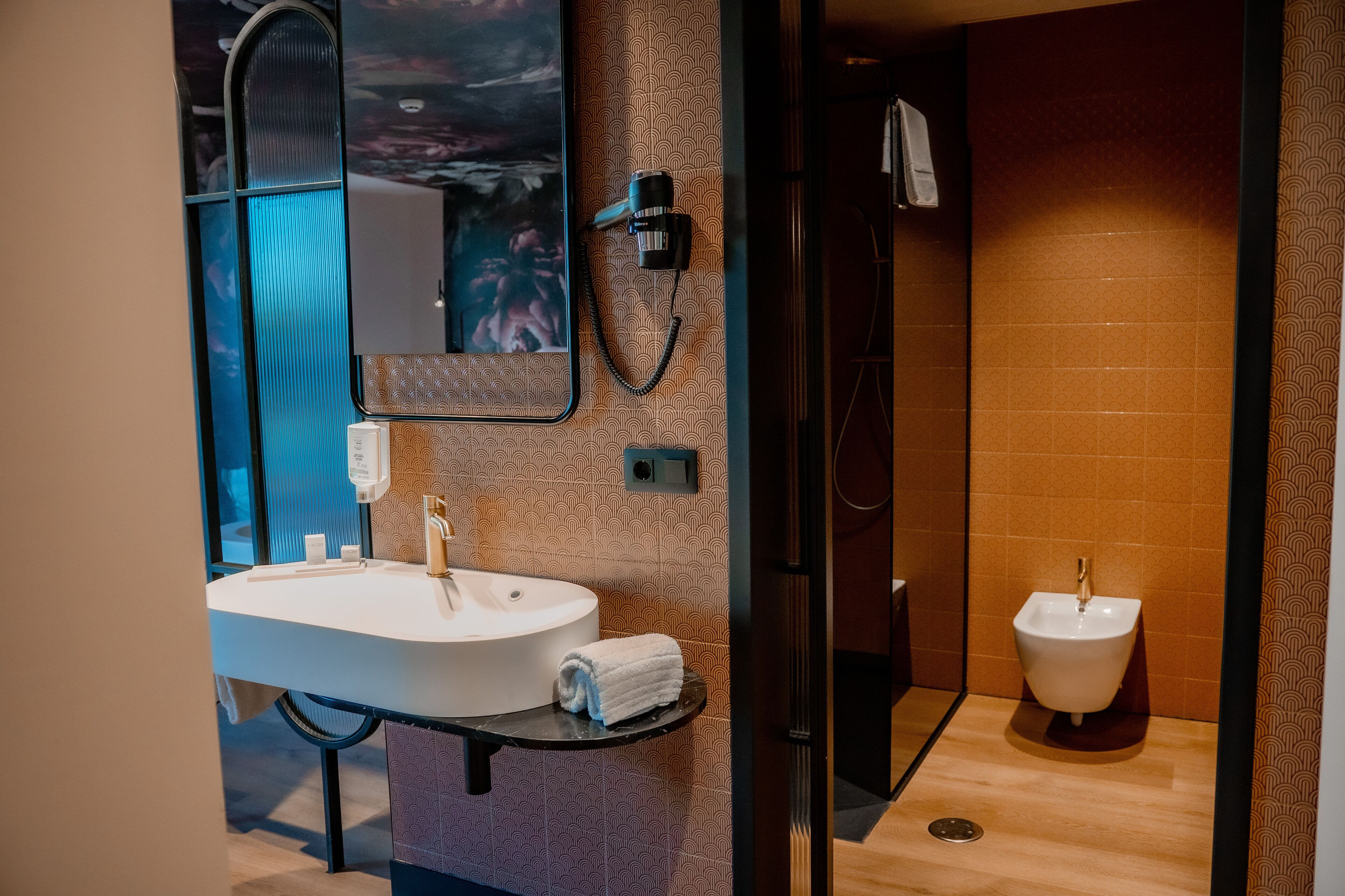 suite | bathroom | deep-soaking bathtub, rainfall showerhead, designer toiletries
