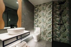 Premium Room | Bathroom | Deep soaking tub, rainfall showerhead, designer toiletries, hair dryer